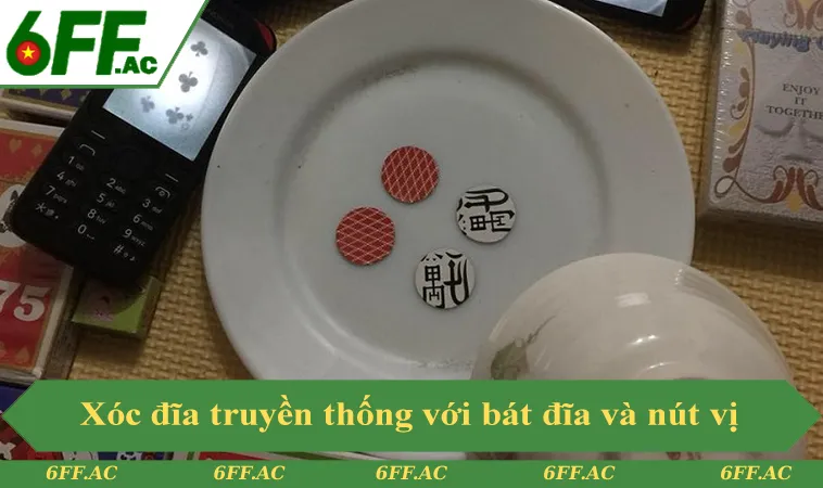 Cách chơi xóc đĩa truyền thống với bát đĩa và nút vị